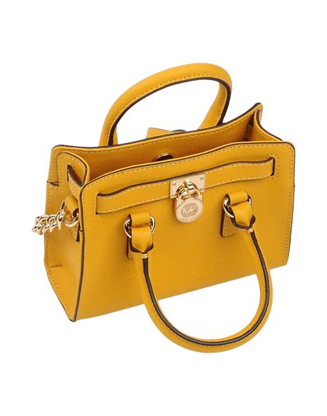 michael kors yellow crossbody|yellow michael kors wallet.